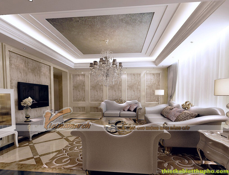 Mẫu trần thạch cao cổ điển phòng khách đẹp lung linh tại chung cư Royal City > Gam màu được sử dụng chủ yếu chỉ là màu trắng, trắng xám,.. mang lại vẻ đẹp phóng khoáng cho phòng khách