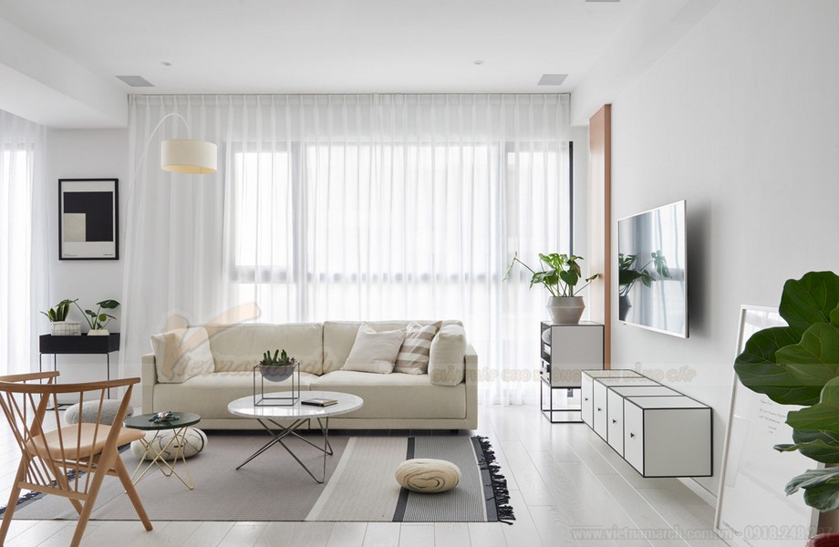 Đồ nội thất phòng khách vô cùng tinh tế và hiện đại với tone màu trắng sữa là chủ yếu.
