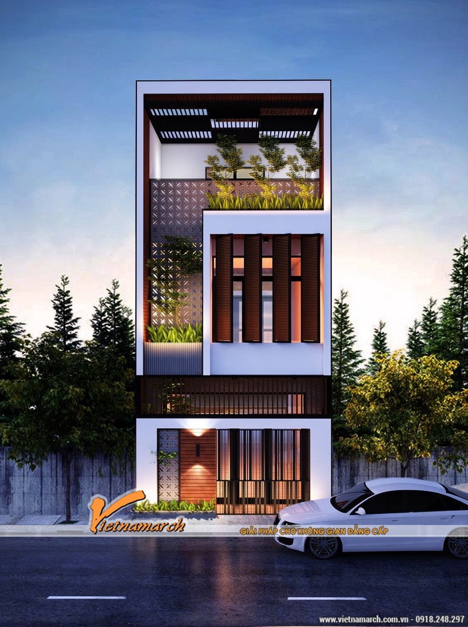 5 mẫu nhà phố 3 tầng hiện đại được thiết kế lỗ thông gió và đón ánh nắng vô cùng độc đáo > Mẫu 2: sự kết hợp hoàn hảo của gạch hoa gió và ban công xanh